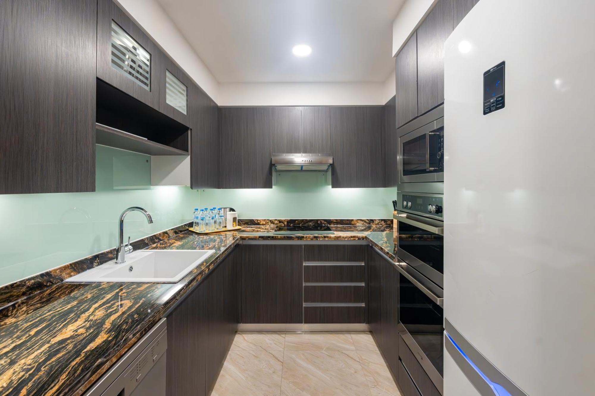 Deluxe Three Bedroom Family Apartment Kitchen on Spa treatments