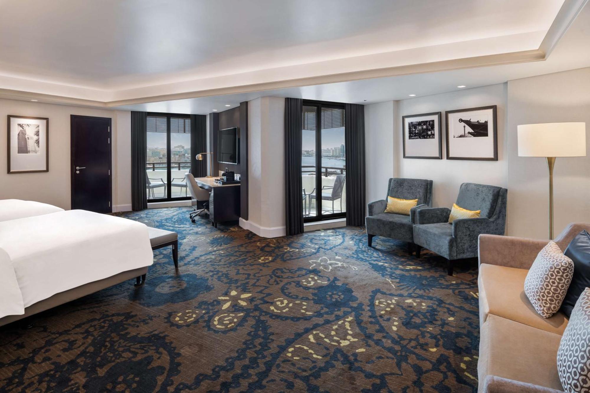 Junior Suite with Lounge Access and Balcony - Creek View